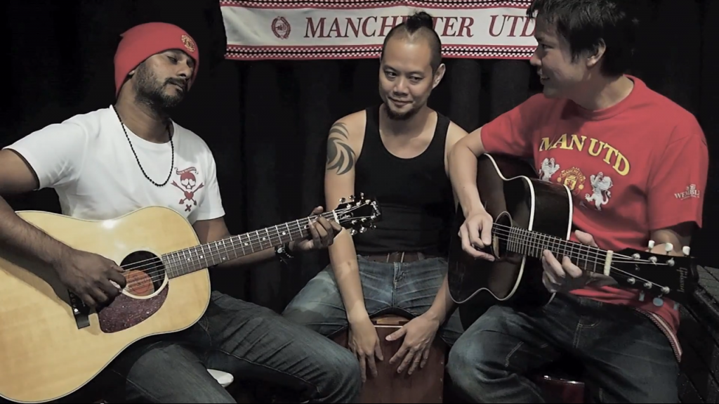 TACKY BACKGROUND CURTAINS: Rai, Andy and Jack performing "OHHH MOYES".